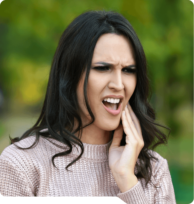 Woman with mouth pain needing emergency dentist in Grand Prairie