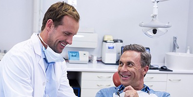 Man smiling in the dental chair 