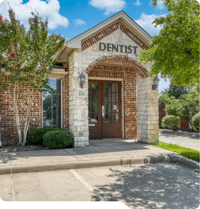 Man and woman smiling outdoors after visiting Grand Prairie dental office