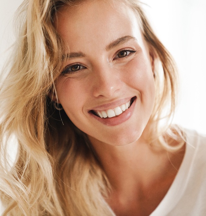 Closeup of woman with blonde hair smiling