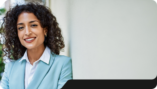 Smiling woman in light blue business jacket