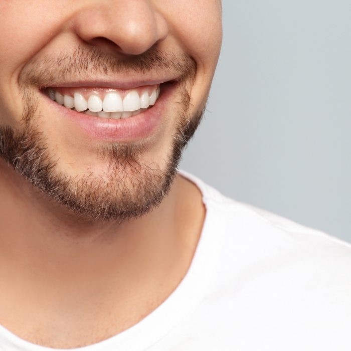 Close up of man with short beard smiling