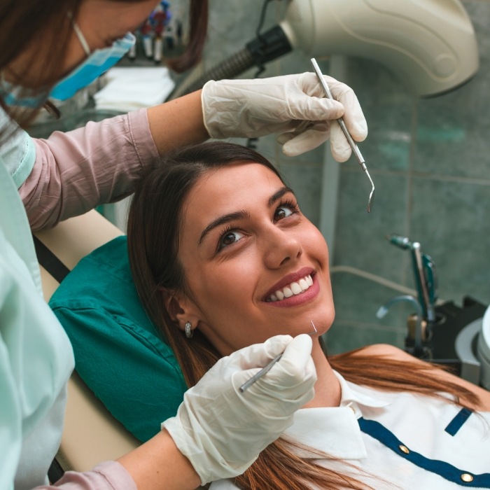 Woman smiling during dental checkup