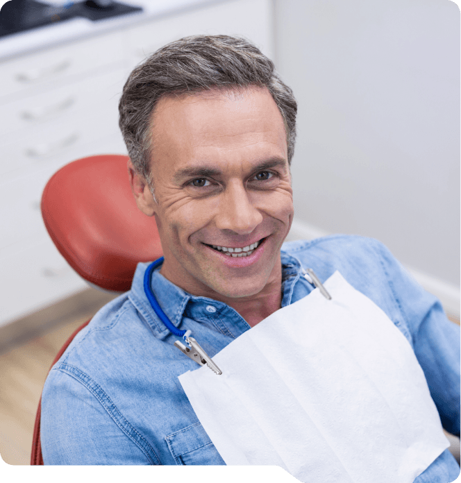 Man smiling in dental chair